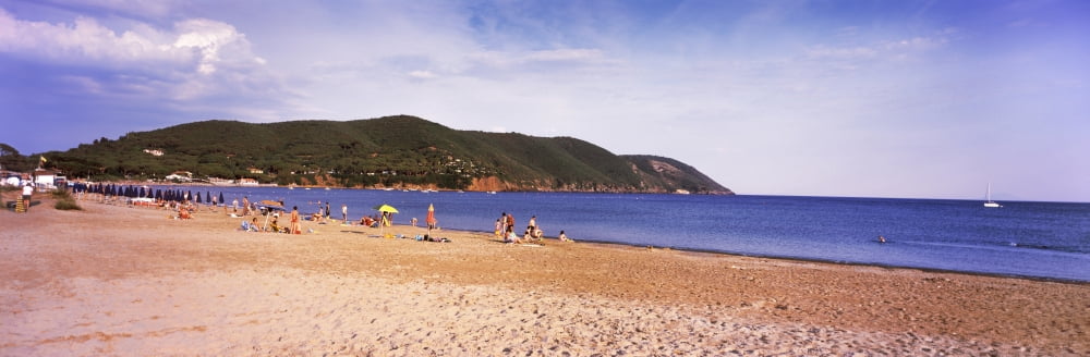 Tourists on the beach Island of Elba Tuscany Italy Canvas Art - Panoramic Images (36 x 12)