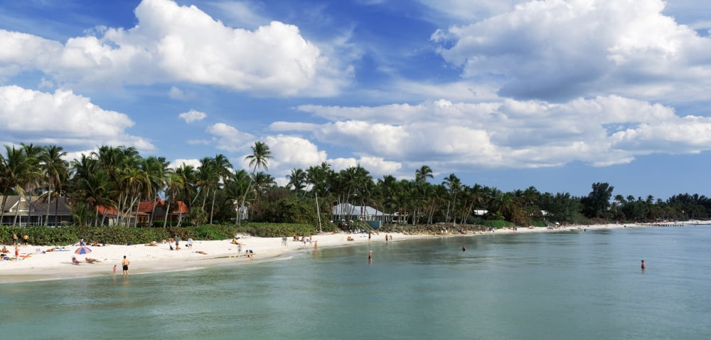 Tourists on the beach Naples Gulf of Mexico Florida USA Canvas Art - Panoramic Images (36 x 12)