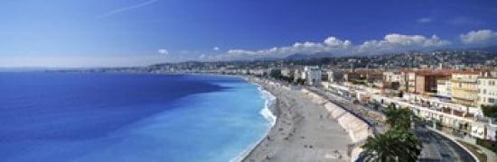 Tourists on the beach Nice Promenade Des Anglais Provence-Alpes-Cote dAzur France Canvas Art - Panoramic Images (36 x 12)