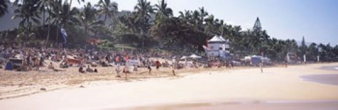 Tourists on the beach North Shore Oahu Hawaii USA Canvas Art - Panoramic Images (18 x 6)