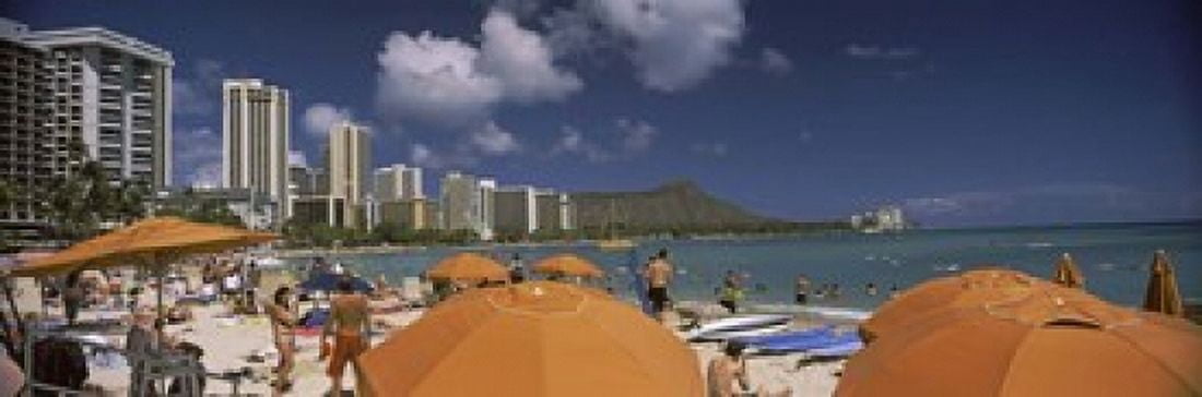 Tourists on the beach Waikiki Beach Honolulu Oahu Hawaii USA 2010 Canvas Art - Panoramic Images (18 x 6)