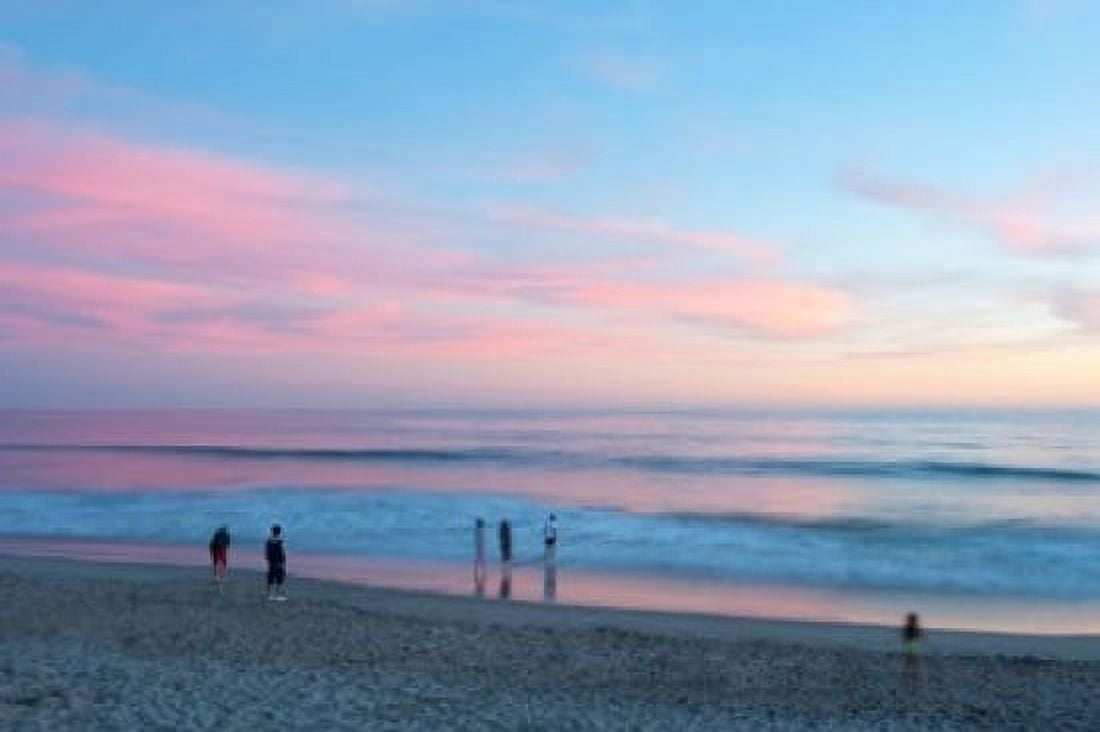 Tourists on the beach at sunset Santa Monica California USA Canvas Art - Panoramic Images (36 x 24)