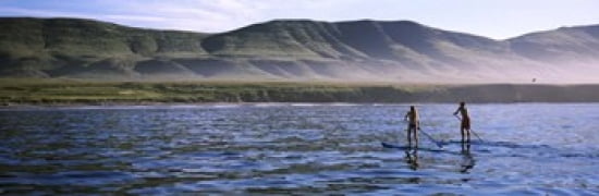 Tourists paddleboarding in the pacific ocean Santa Cruz Island Santa Barbara County California USA Canvas Art - Panoramic Images (36 x 12)