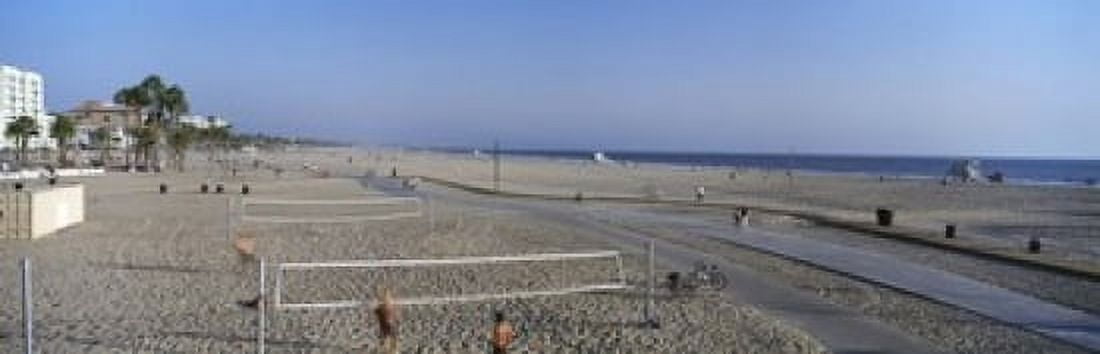 Tourists playing volleyball on the beach Santa Monica Los Angeles County California USA Canvas Art - Panoramic Images (18 x 6)