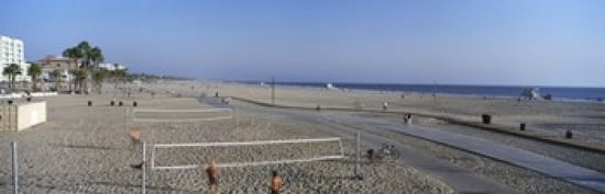 Tourists playing volleyball on the beach Santa Monica Los Angeles County California USA Canvas Art - Panoramic Images (36 x 12)