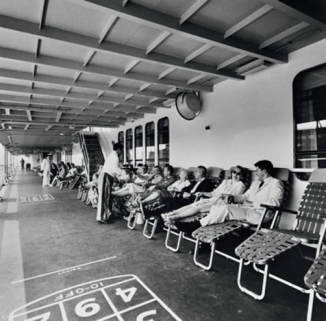 Tourists reclining on lawn chairs on a cruise ship Canvas Art - (24 x 36)