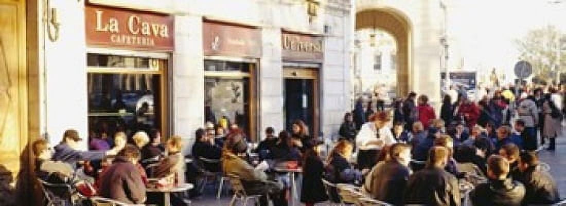 Tourists sitting outside of a cafe Barcelona Spain Canvas Art - Panoramic Images (18 x 7)