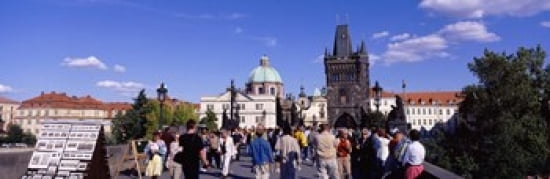 Tourists walking in front of a building Charles Bridge Prague Czech Republic Canvas Art - Panoramic Images (36 x 12)