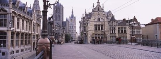 Tourists walking in front of a church St Nicolas Church Ghent Belgium Canvas Art - Panoramic Images (36 x 13)