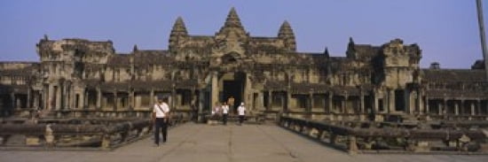 Tourists walking in front of an old temple Angkor Wat Siem Reap Cambodia Canvas Art - Panoramic Images (36 x 12)