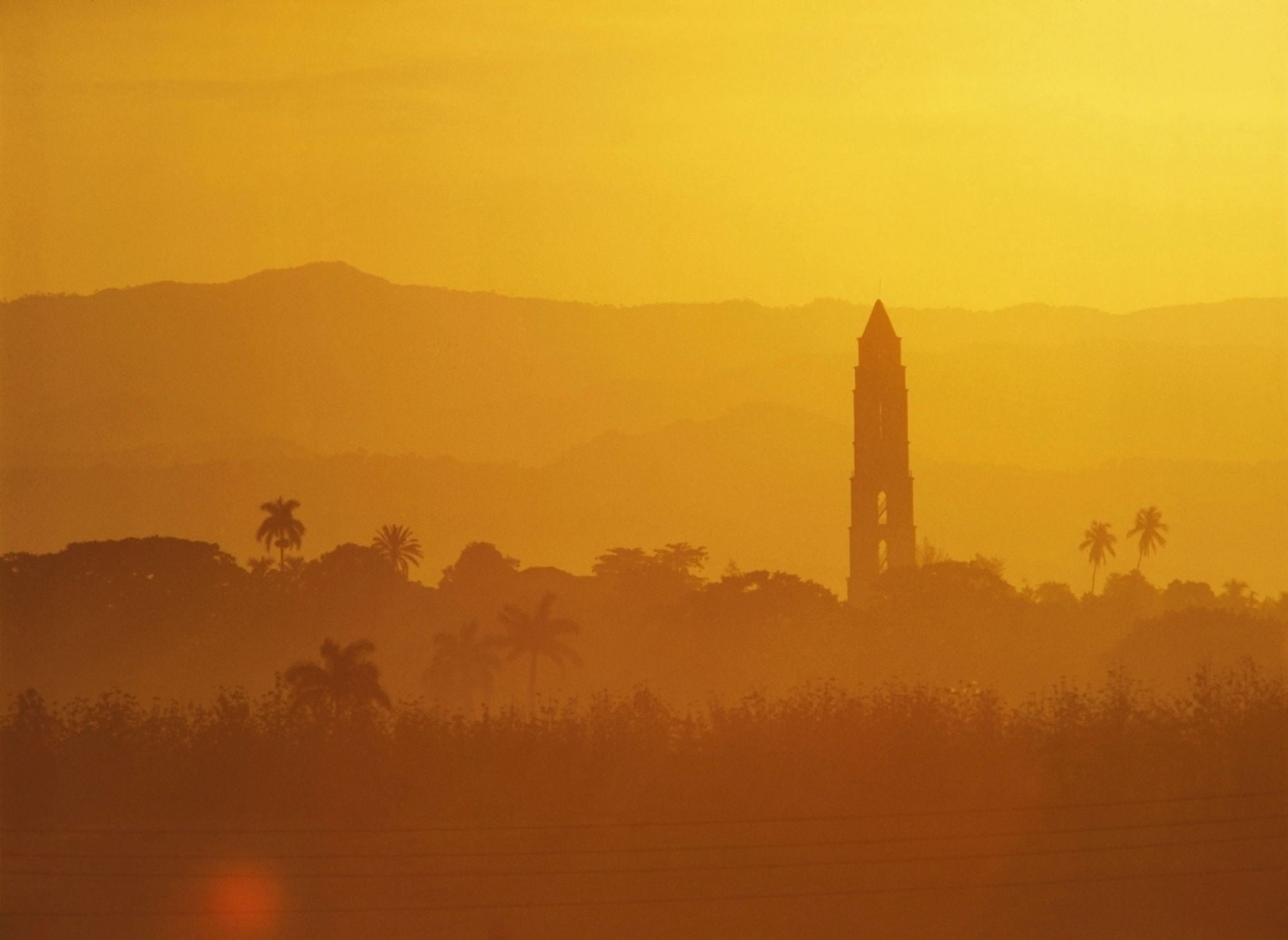 Tower Silhouetted Amongst Orange Mountains Canvas Art - Ian Cumming Design Pics (16 x 12)