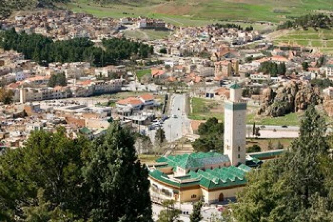 Town View from The Great Rock Azrou Middle Atlas Morocco Canvas Art - Walter Bibikow DanitaDelimont (34 x 23)
