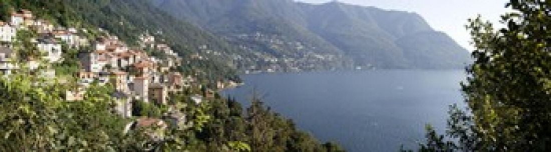 Town at the waterfront Lake Como Como Lombardy Italy Canvas Art - Panoramic Images (21 x 6)