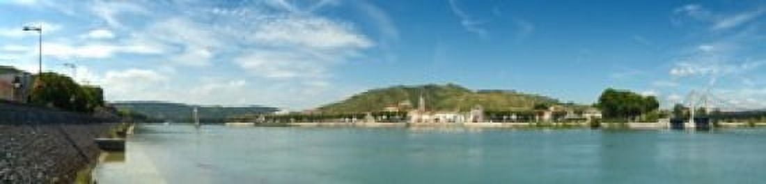 Town at the waterfront vineyards on the hill in background Tain-lHermitage Rhone River Rhone-Alpes France Canvas Art - Panoramic Images (20 x 5)