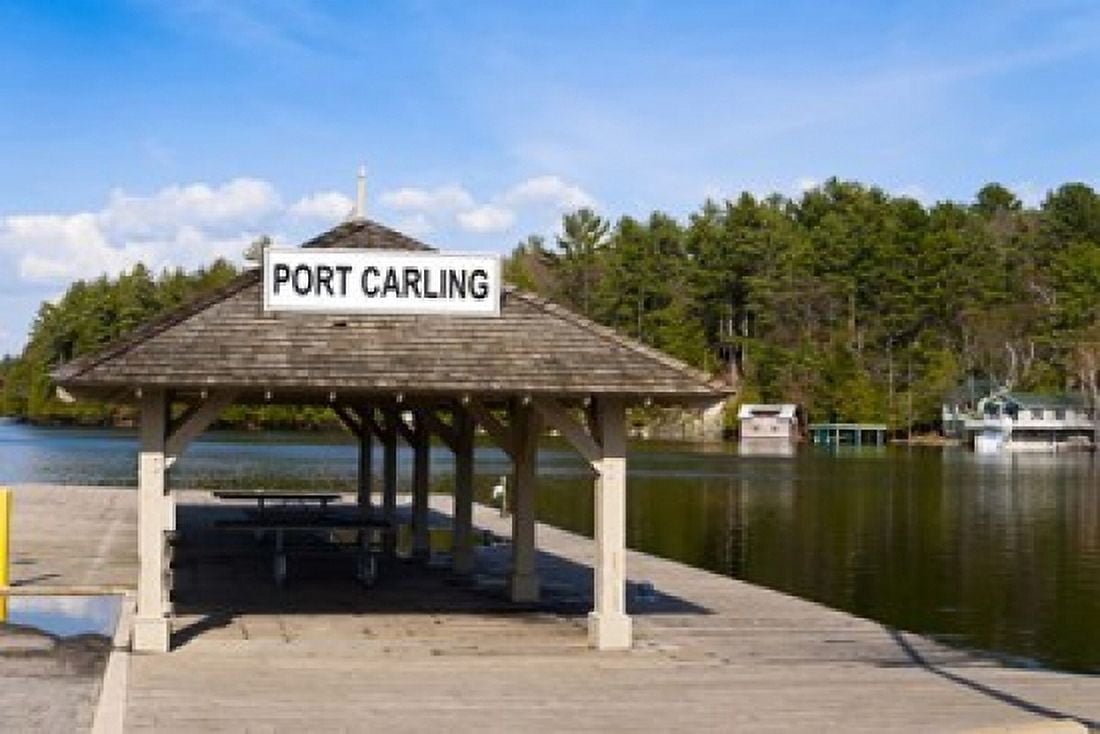 Town dock and cottages at Port Carling Ontario Canada Canvas Art - Panoramic Images (36 x 24)