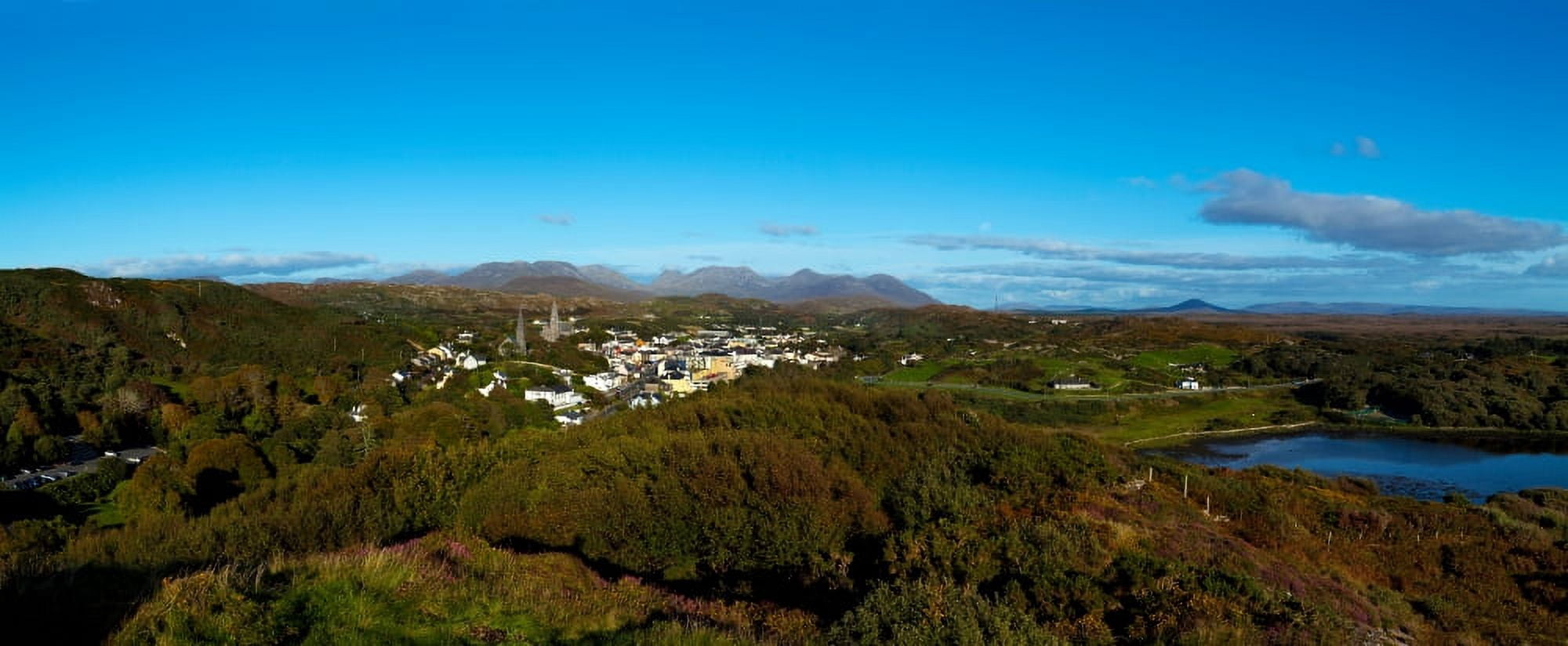 Town on a hill with 12 Pin Mountain Range in the background Clifden Connemara County Galway Republic of Ireland Canvas Art - Panoramic Images (36 x 12)