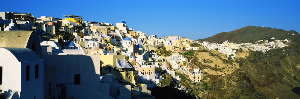 Town on an island Oia Santorini Cyclades Islands Greece Canvas Art - Panoramic Images (27 x 9)