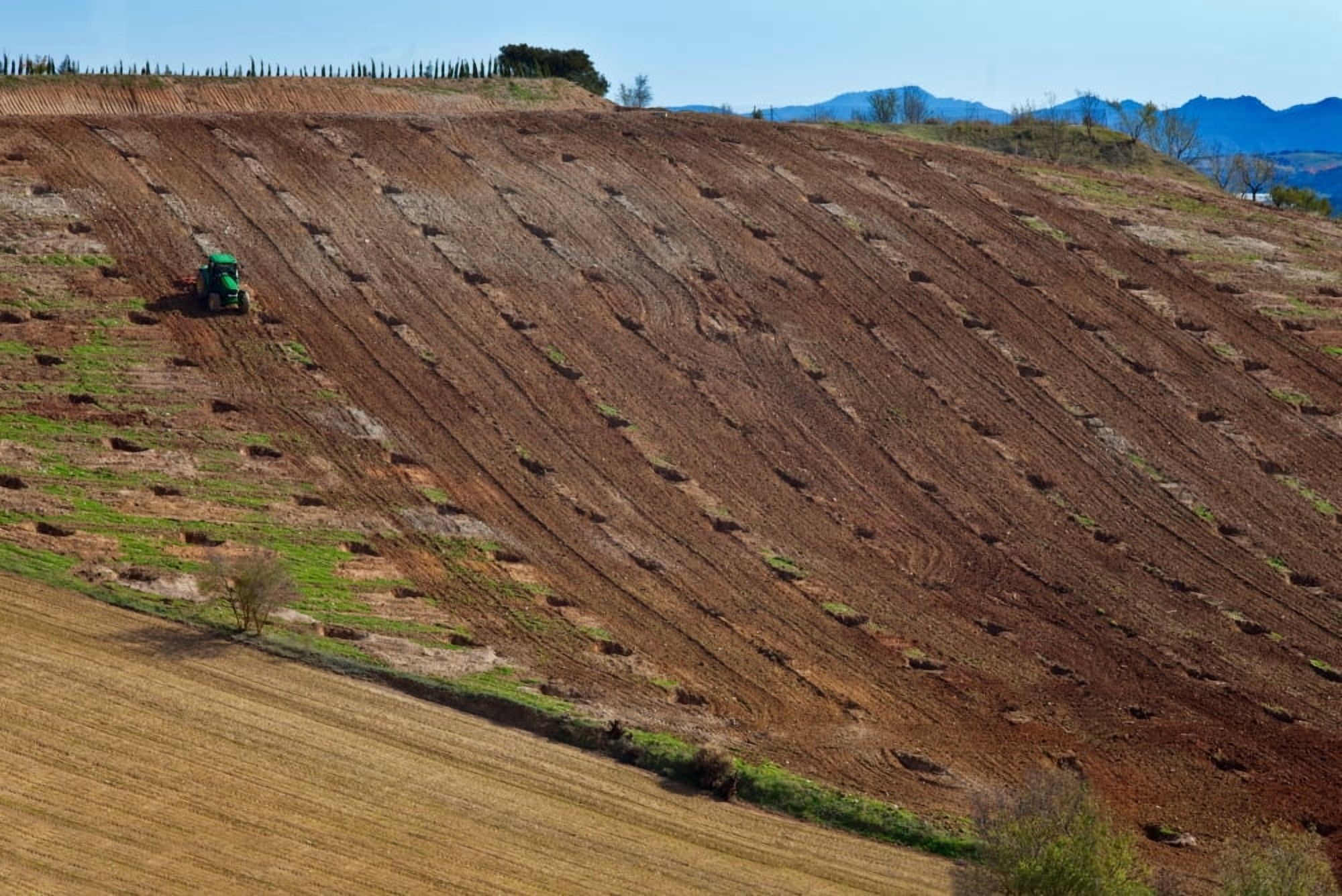 Tractor preparing a field Near Alhama de Granada Granada Province Spain Canvas Art - Panoramic Images (27 x 9)