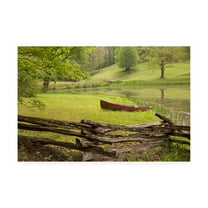 Trademark Fine Art 'Canoe And Fence' Canvas Art by Monte Nagler
