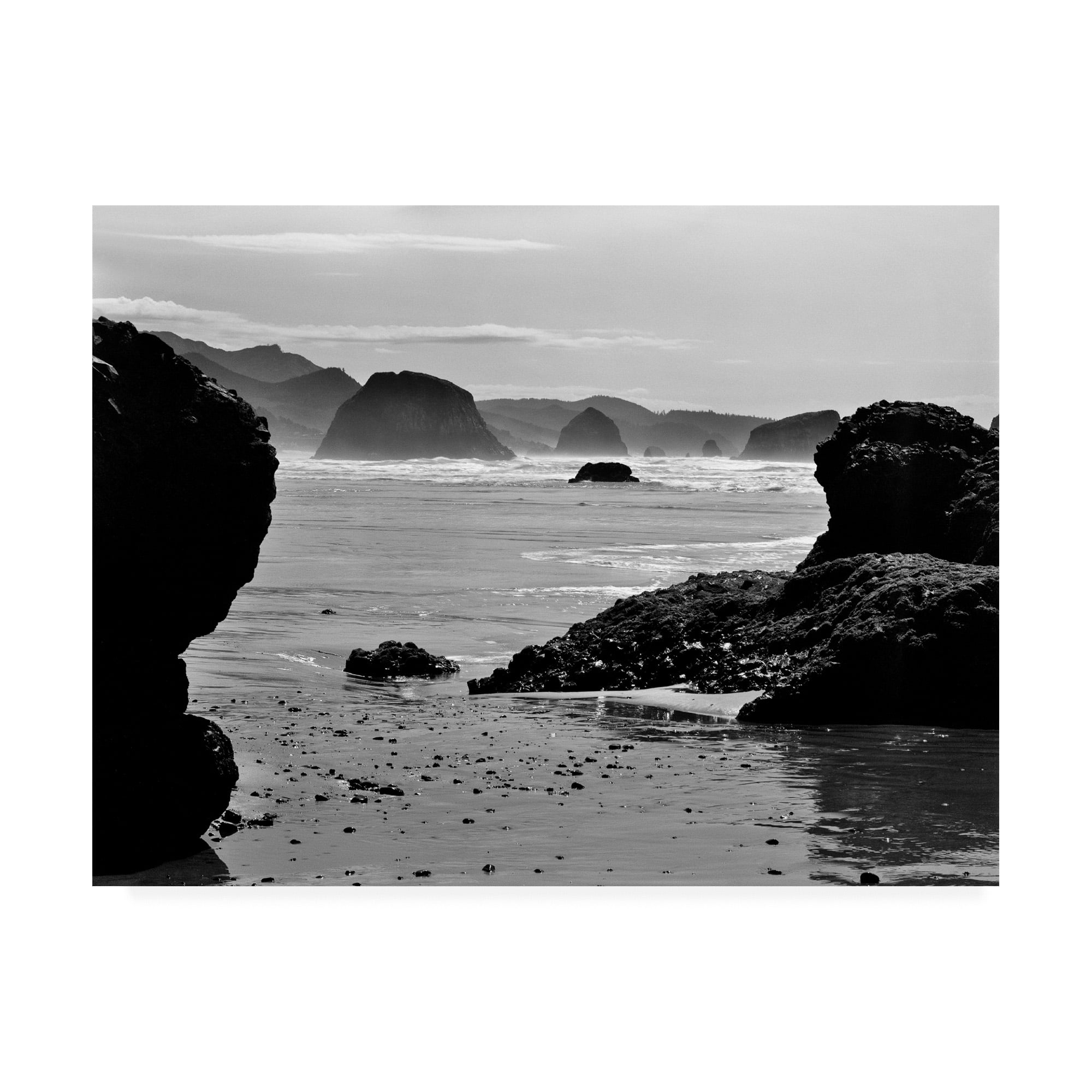 Trademark Fine Art 'Canon Beach Rocks' Canvas Art by Monte Nagler