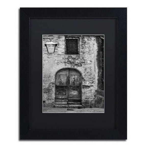Trademark Fine Art "San Gimignano Door" Canvas Art by Moises Levy Black Matte, Black Frame