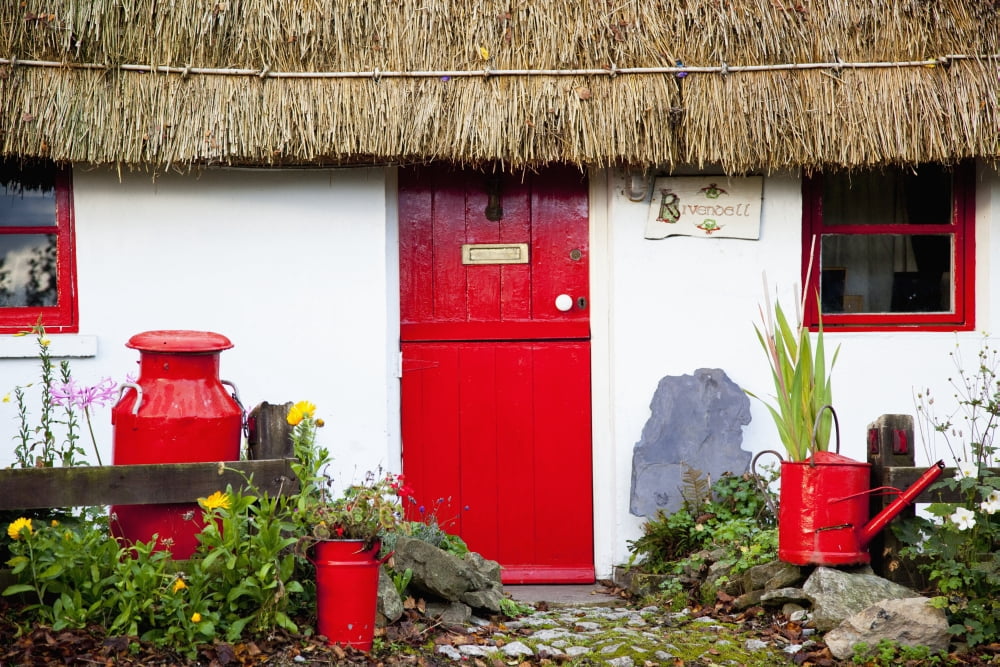 Traditional Irish Cottage With A Red Door And Red Decorative Items Currabinny County Cork Ireland Canvas Art - Peter Zoeller Design Pics (38 x 24)