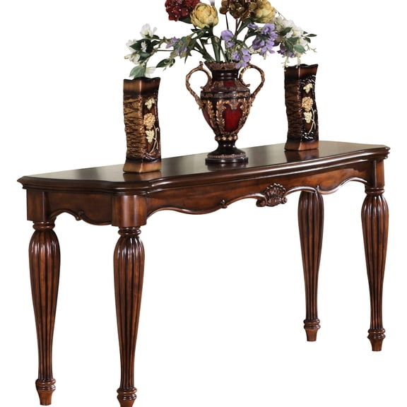 Traditional cherry sofa table / For primary living space use / Features fluted legs