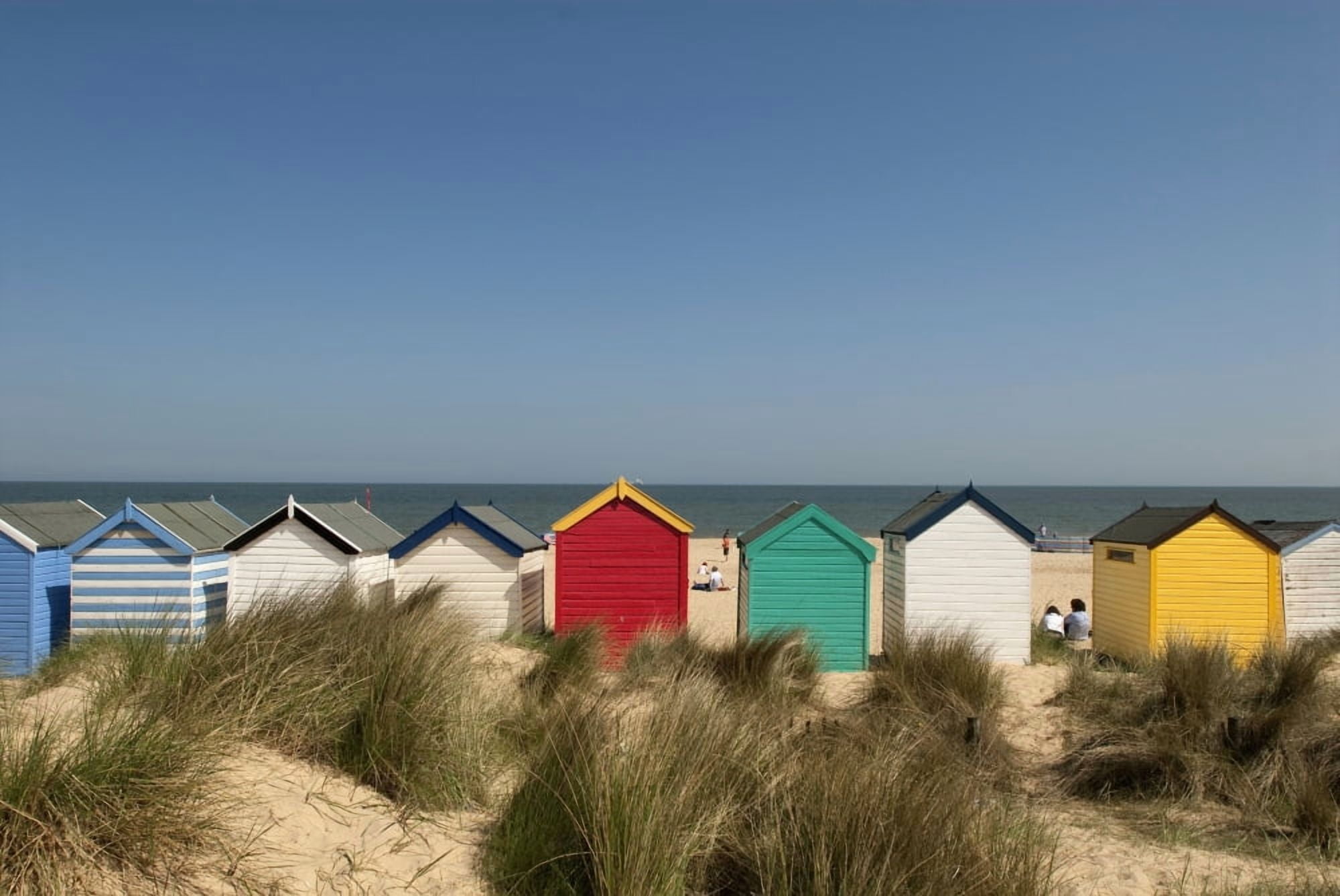 Traditional colourful beach huts in the sand dunes Southwold Suffolk England Canvas Art - David Potter Design Pics (18 x 12)