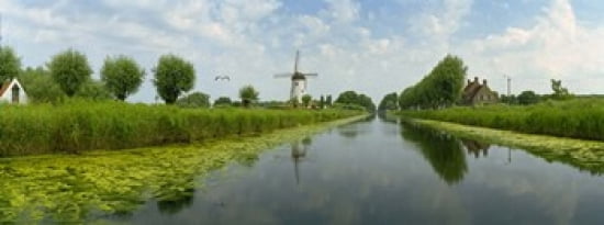 Traditional windmill along with a canal Damme Belgium Canvas Art - Panoramic Images (30 x 12)