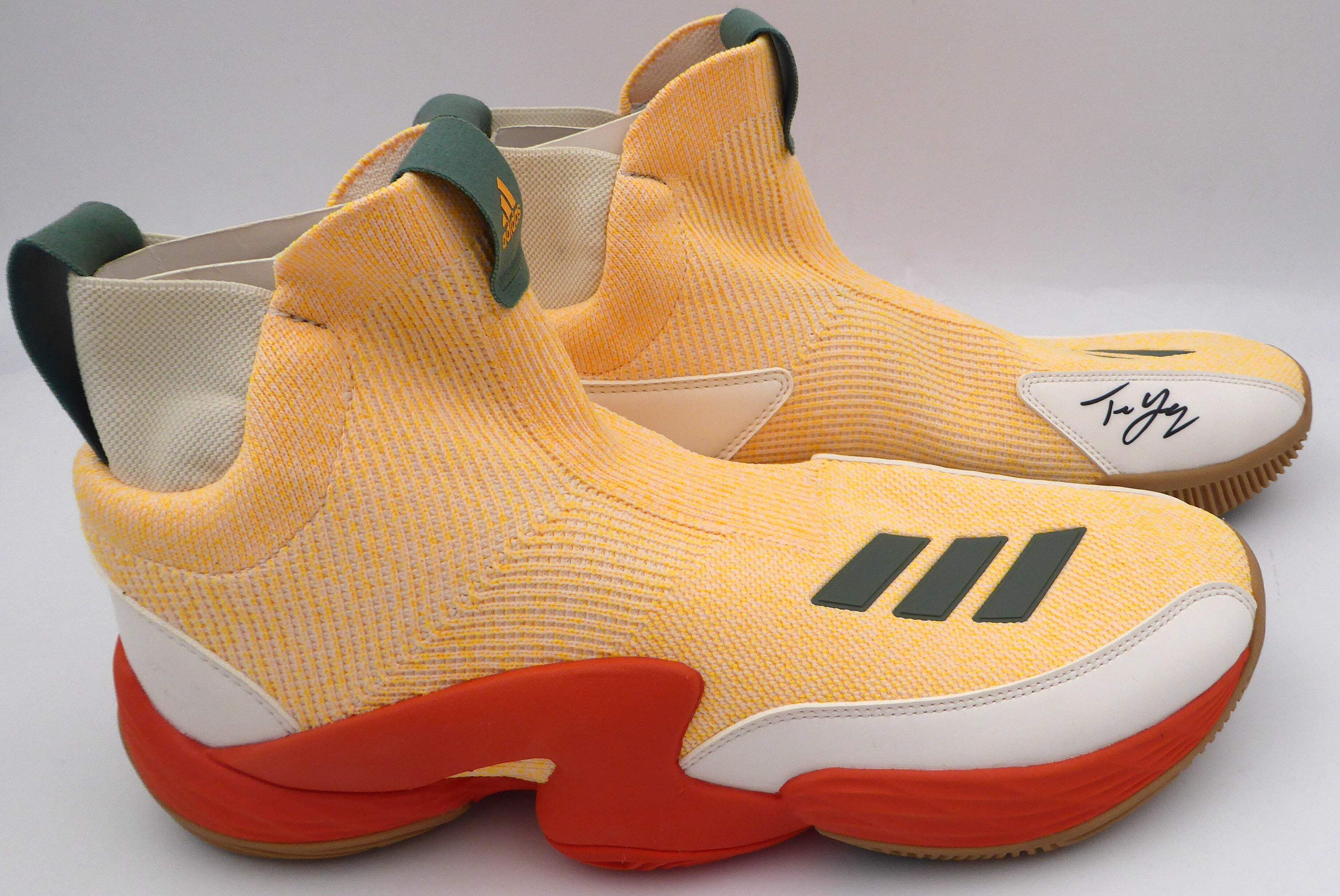 trae young shoes peach