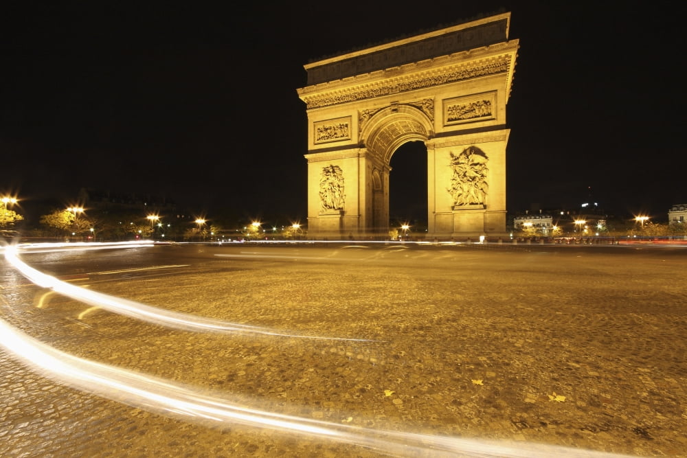 Traffic Light Trails Around The Arc De Triomphe Paris France Canvas Art - Trish Punch  Design Pics (38 x 24)