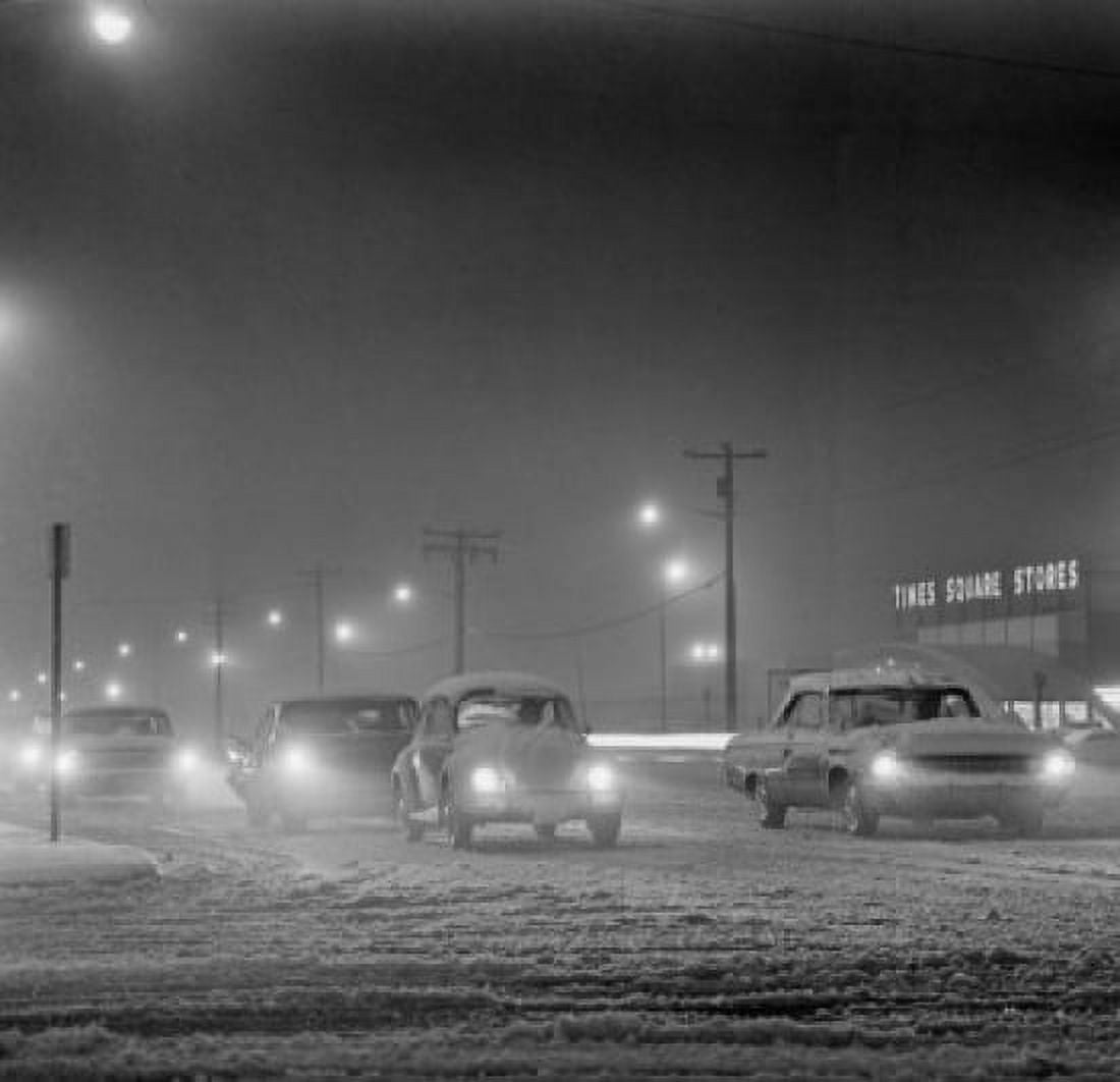 Traffic at night on highway during snowstorm Canvas Art - (18 x 24)