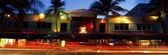 Traffic in front of a building at dusk Art Deco District South Beach Miami Beach Miami-Dade County Florida USA Canvas Art - Panoramic Images (36 x 12)