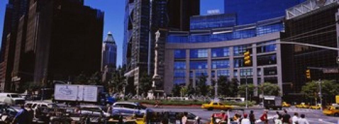 Traffic on the road in front of buildings Columbus Circle Manhattan New York City New York State USA Canvas Art - Panoramic Images (18 x 7)
