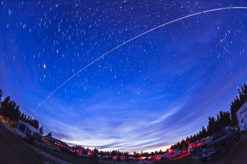 Trail of the International Space Station as it passes over a campground in Canada Canvas Art - Alan DyerStocktrek Images (35 x 23)