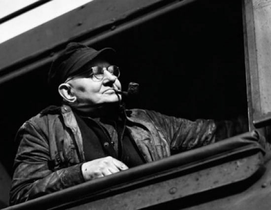 Train conductor leaning out of engine window Canvas Art - (18 x 24)