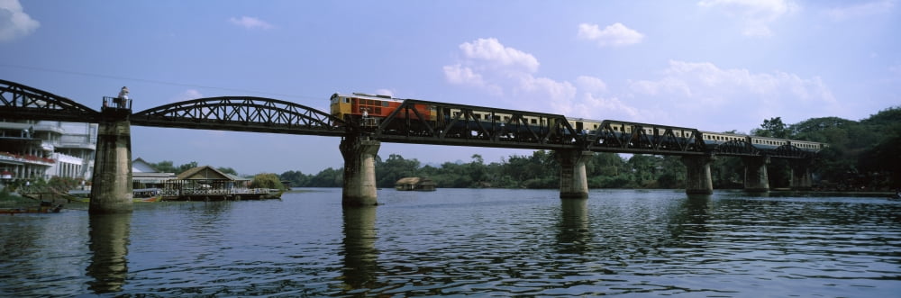 Train moving on a bridge Thailand Canvas Art - Panoramic Images (12 x 36)