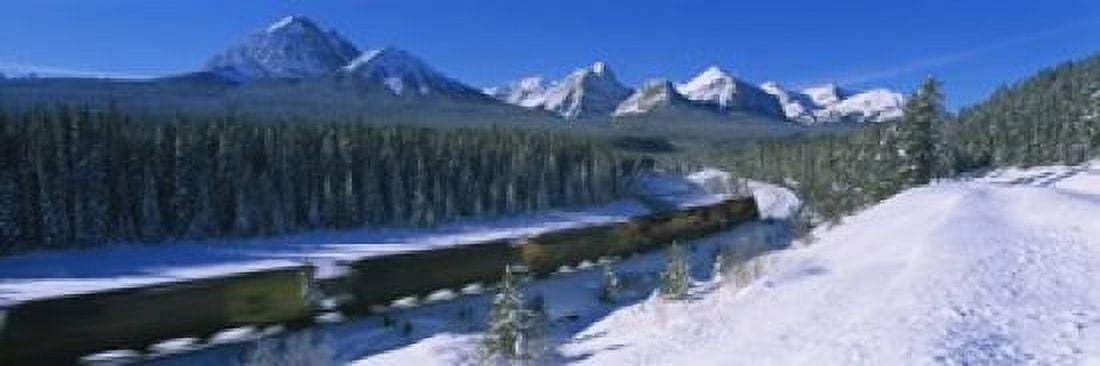 Train moving on a railroad track with a mountain range in the background Banff National Park Alberta Canada Canvas Art - Panoramic Images (18 x 6)