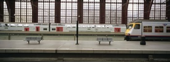 Trains at a railroad station platform Antwerp Belgium Canvas Art - Panoramic Images (36 x 13)
