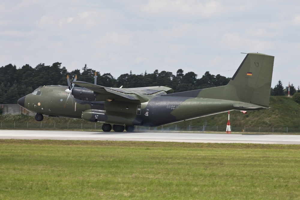 Transall C-160G of the German Air Force touching down on the runway Canvas Art - Timm ZiegenthalerStocktrek Images (35 x 23)