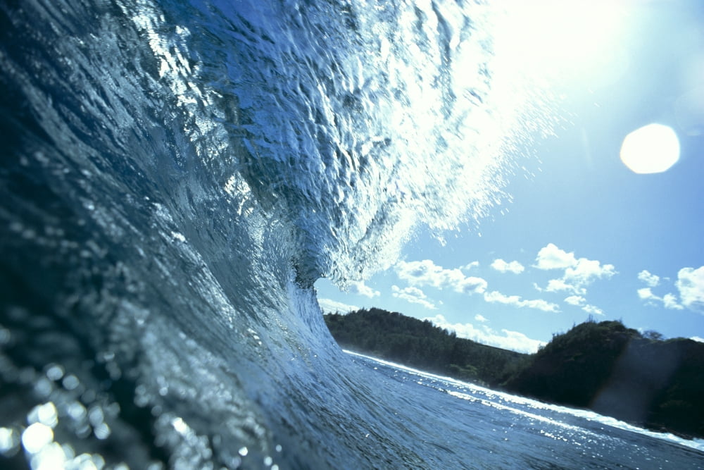 Translucent Curling Blue Wave Backlit Shimmery Waters Land In Background Canvas Art - Erik Aeder Design Pics (38 x 24)