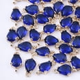 thumbnail image 1 of Transparent Glass Links connectors for Jewelry DIY Craft Making with Brass Findings Faceted Teardrop Light Gold Medium Blue 13x7x3.5mm Hole: 1.2mm, 1 of 2