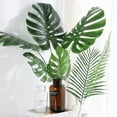 thumbnail image 1 of Travelwant 10Pcs Artificial Monstera Leaves Tropical Palm Plants Leaves Large with Long Stem for Vase Home Wedding Decorations, 1 of 7