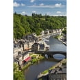 thumbnail image 1 of Treed valley riverside town stone bridge and boats in the harbour with blue sky, 1 of 3