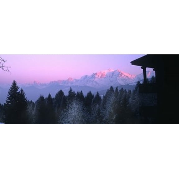 Trees with snow covered mountains at sunset in winter Combloux Mont Blanc Massif Haute-Savoie Rhone-Alpes France Canvas Art - Panoramic Images (30 x 12)