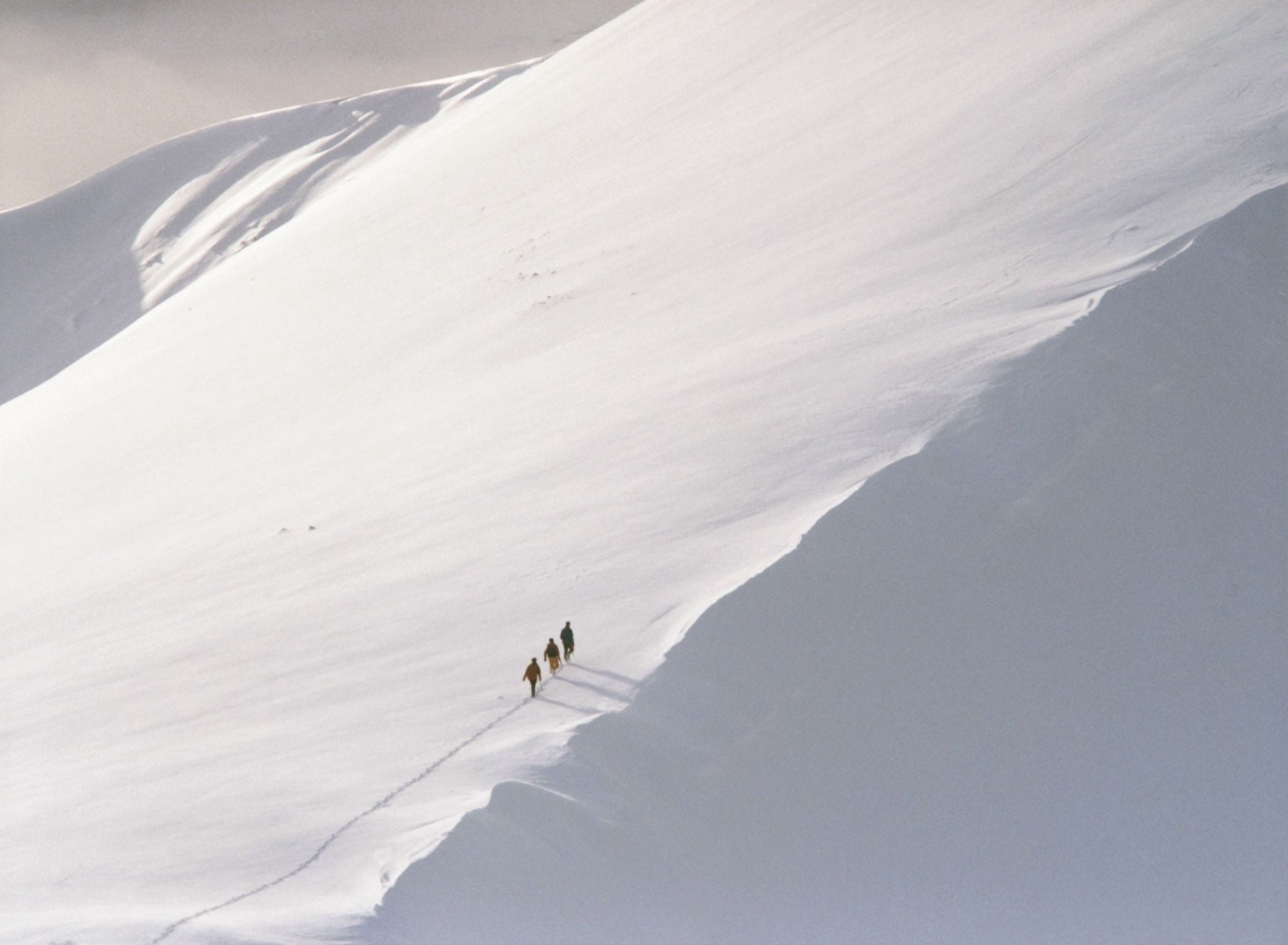 Trekking Up Snowy Mountain Canvas Art - Ian Cumming Design Pics (16 x 11)