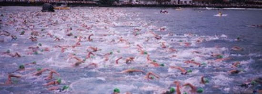 Triathlon athletes swimming in water in a race Ironman Kailua Kona Hawaii USA Canvas Art - Panoramic Images (18 x 7)