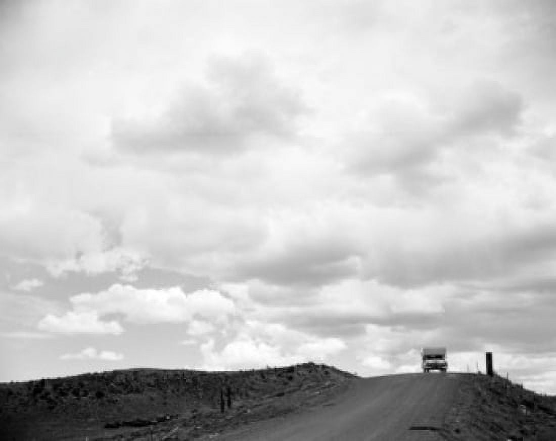 Truck driving down country road Canvas Art - (18 x 24)