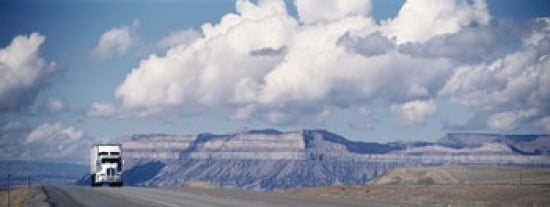 Truck on the road Interstate 70 Green River Utah USA Canvas Art - Panoramic Images (30 x 12)