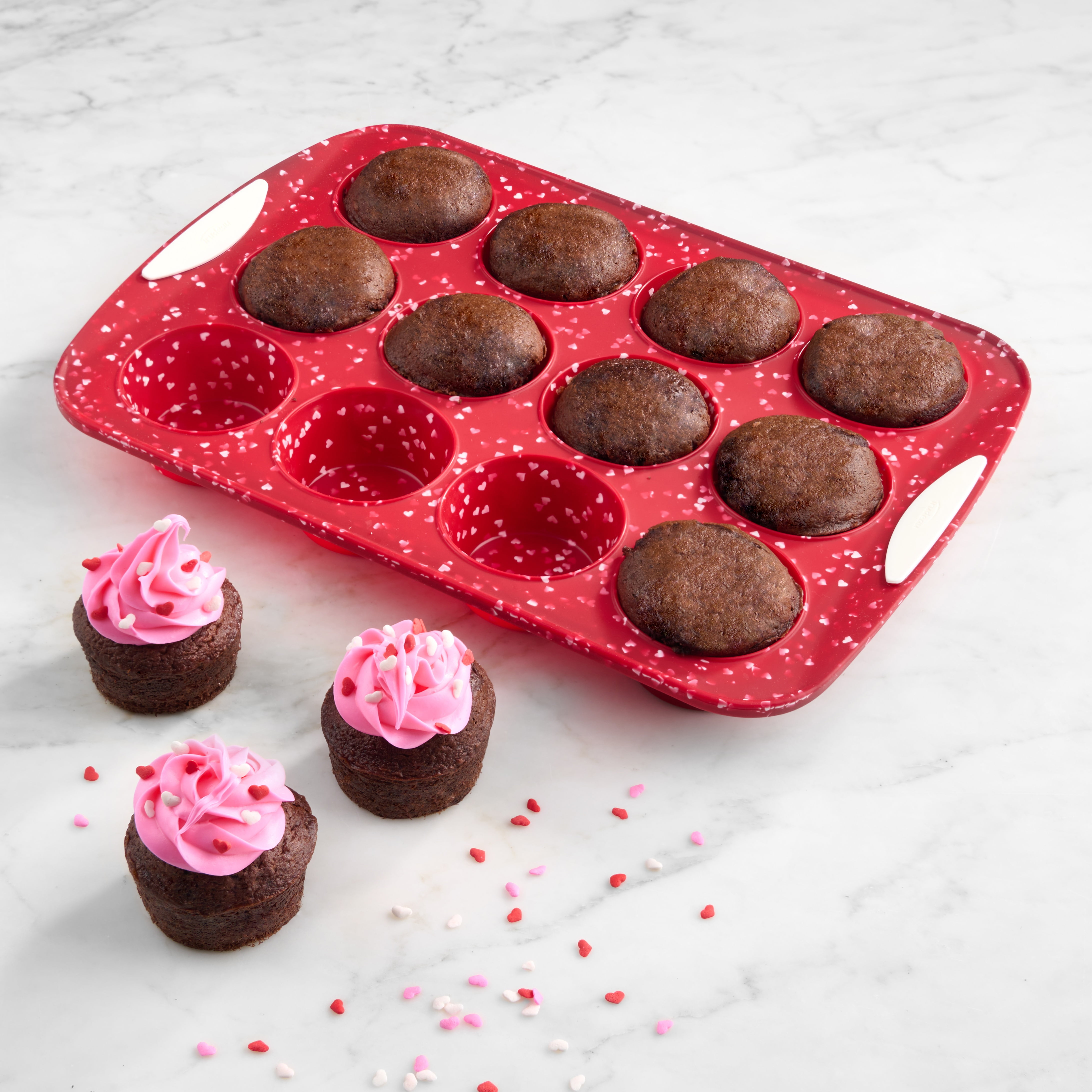 https://i5.walmartimages.com/seo/Trudeau-Silicone-Muffin-Pan-Patented-Structure-Silicone-Red-Heart-Confetti-12-Count_7459f1e2-8834-42b6-a755-23781933e77c.5b4c1ab2a96c11ae0adadf0b5bfd6625.jpeg